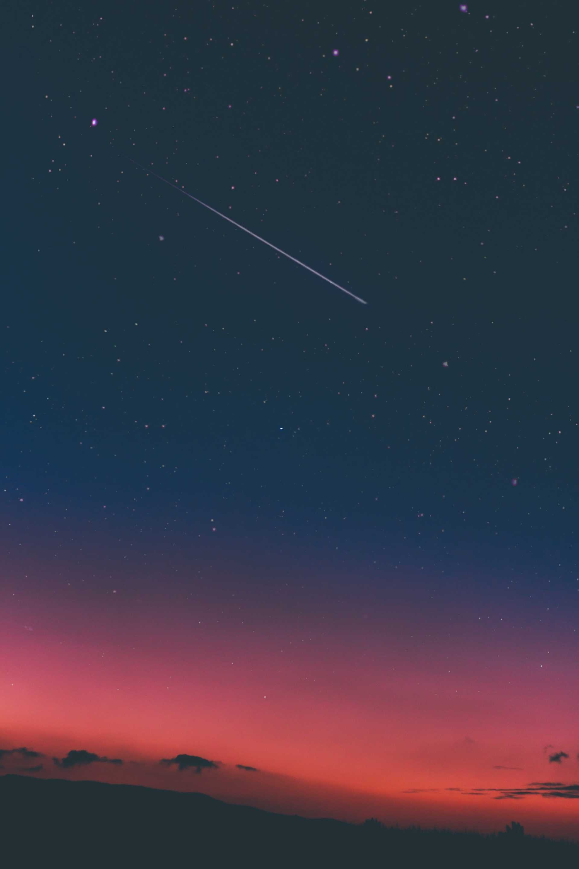 The sunset sky with a shooting star